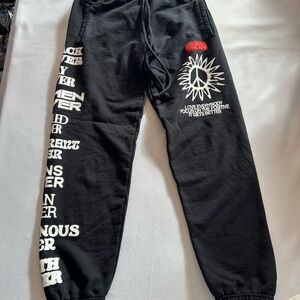 CHNGE Black Sweatpants with Red and White Graphic